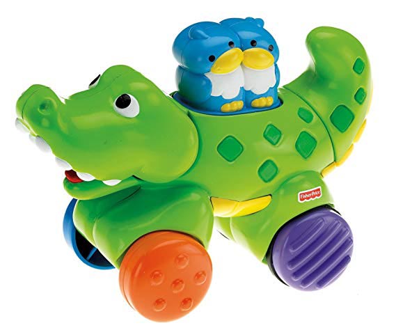 Green Fisher-Price Press and Go Crocodile push toy with two blue owls riding on its back