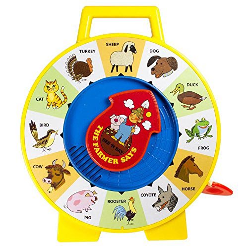 Yellow See 'n Say farm animal toy with a spinner and animal pictures around the dial